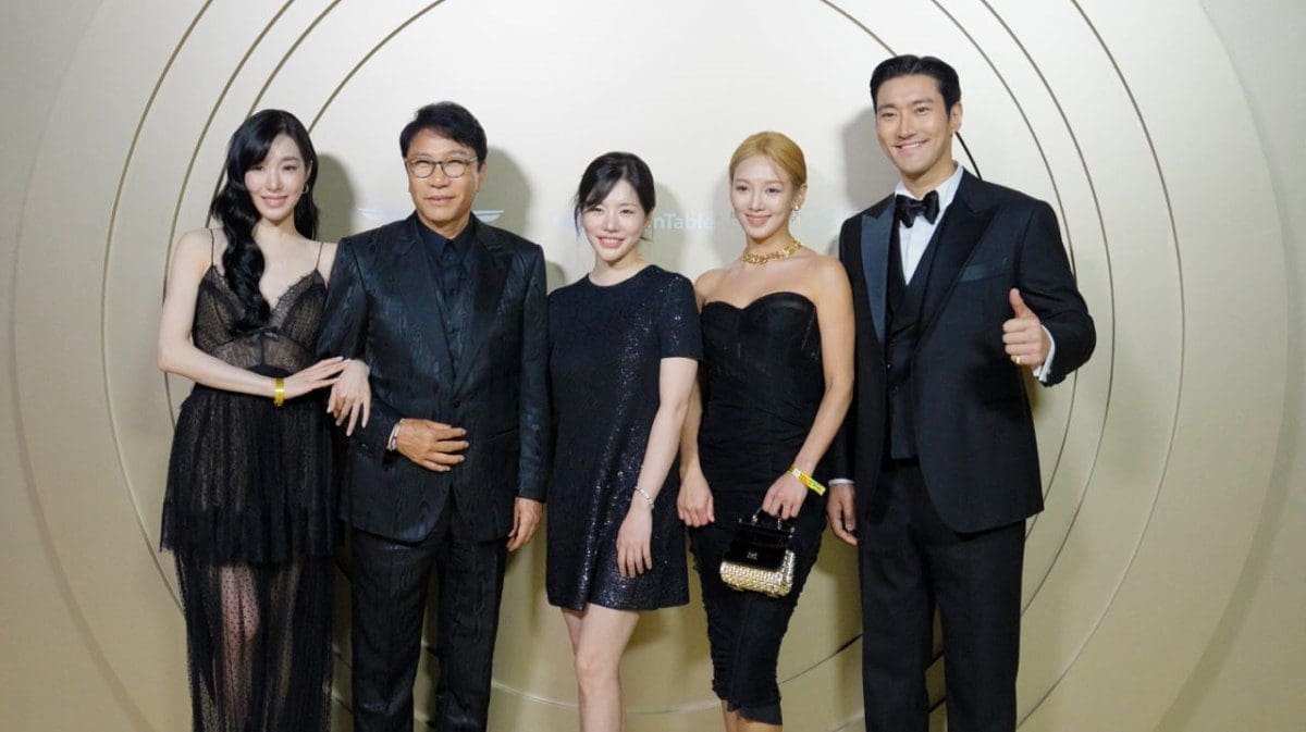 Lee Soo Man with K-pop stars at documentary premiere