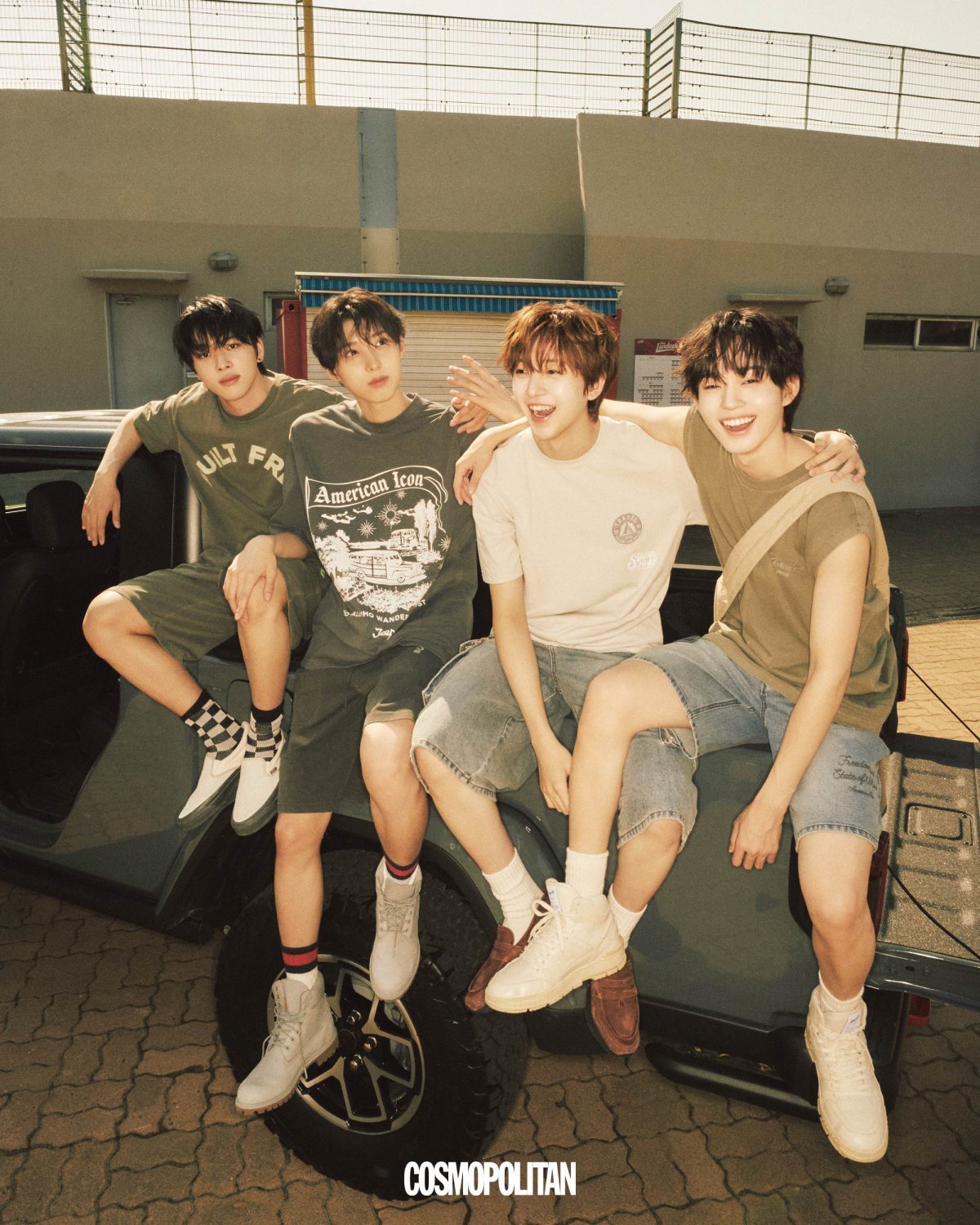 Kickflip members in street-style vintage and travel-inspired outfits for Cosmopolitan.