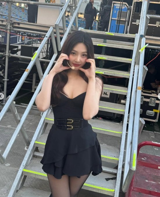 Red Velvet Joy black mini dress rehearsal