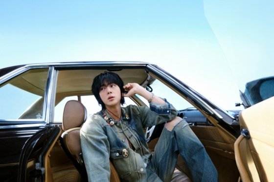 BTS Jin celebrates UK chart success with 'Echo'