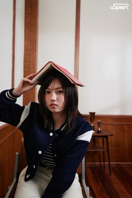 USPEER debut concept photo showing the group in varsity outfits